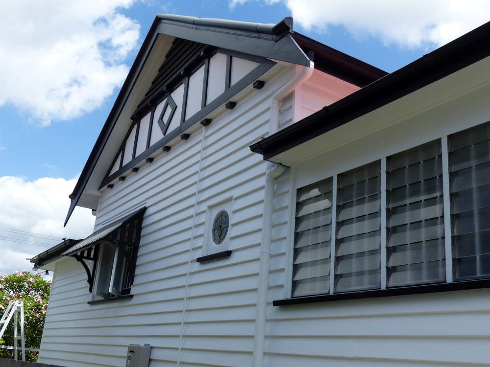Ashgrove gable in white with black battens and a diamond vent