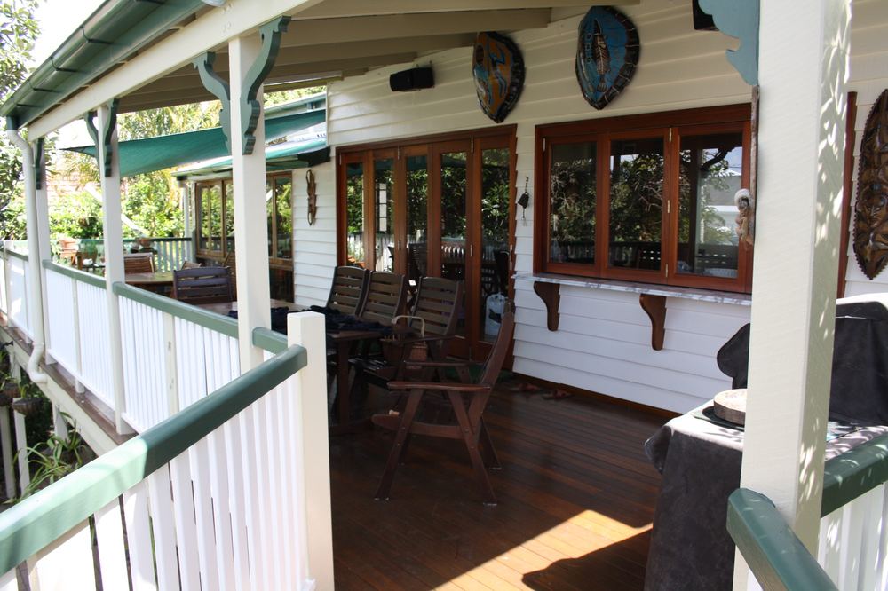 Kedron Queenslander balcony with green and white railings
